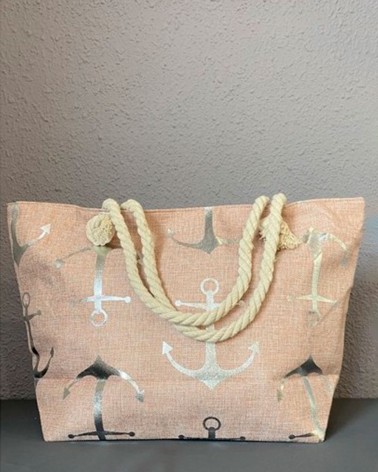Bolso de playa rosa palo con anclas plateadas y asas de cuerda gruesa