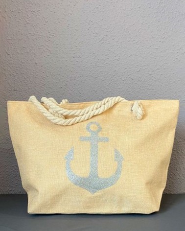 Bolso de playa beige arena con asa de cuerda y ancla plateada