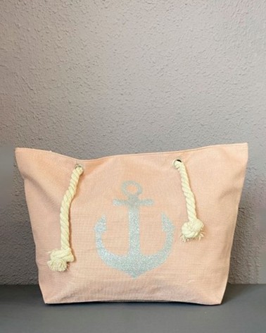 Bolso de playa rosa nude con ancla plateada y asas de cuerda
