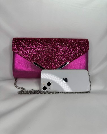 Clutch fucsia con solapa de purpurina