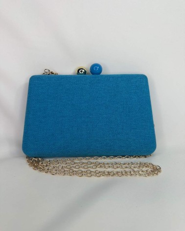 Clutch azul lino con cierre joya