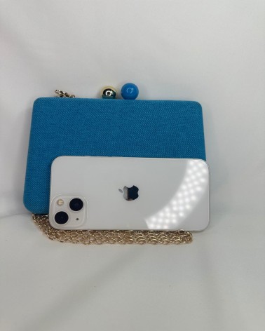 Clutch azul lino con cierre joya