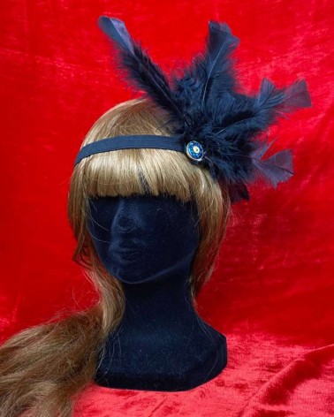 Diadema negra con plumas y botón azul vintage