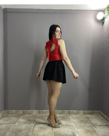 Falda negra de terciopelo con estampado animal print