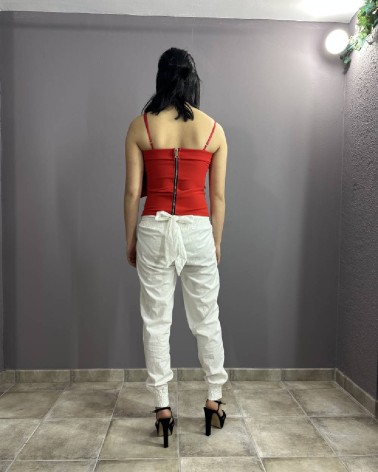 Pantalón largo blanco y lazo en la espalda