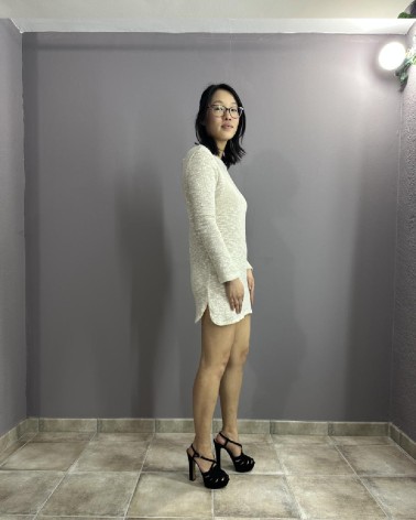 Vestido corto de punto y manga larga