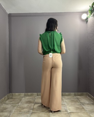 Pantalón largo beige claro con cinturón de cuerda