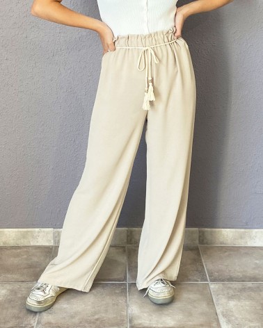 Pantalón fluido beige con cintura fruncida y cordón